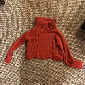 Red turtleneck sweater